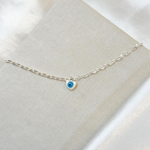 Tornozeleira Olho Grego Coração