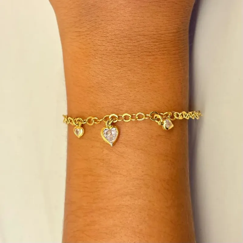 Pulseira três corações