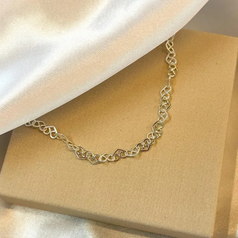 Pulseira Corações Entrelaçados