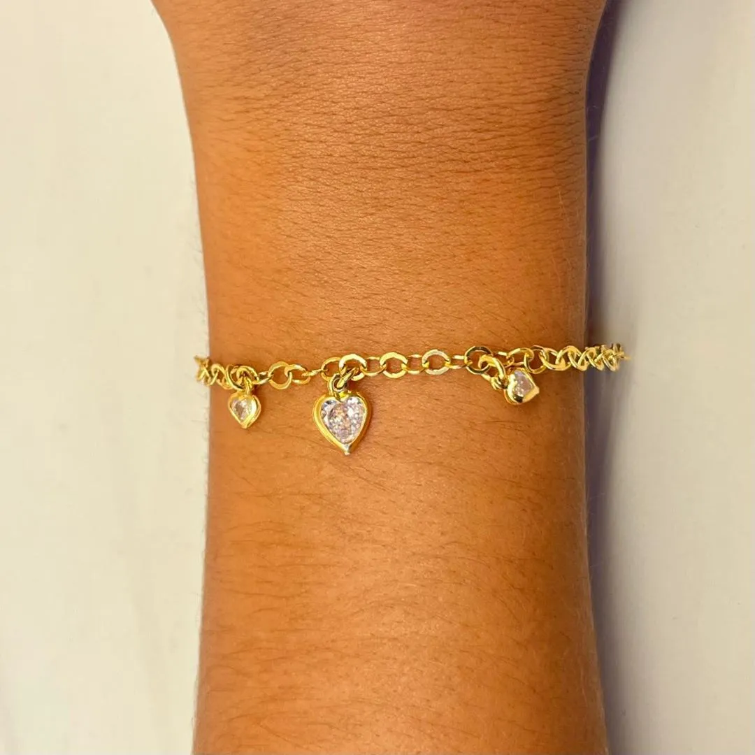 Pulseira três corações